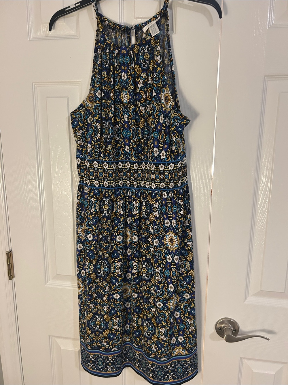 Women's patterned spaghetti strap dress.